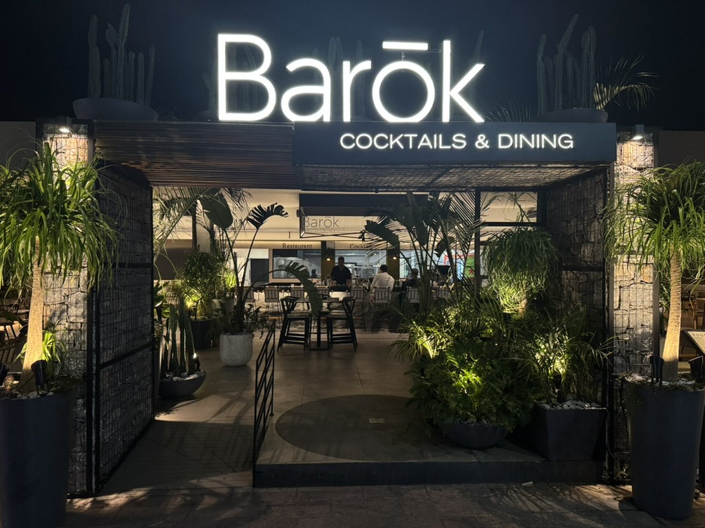 The illuminated entrance of Barok Cocktails & Dining in Faliraki, Rhodes